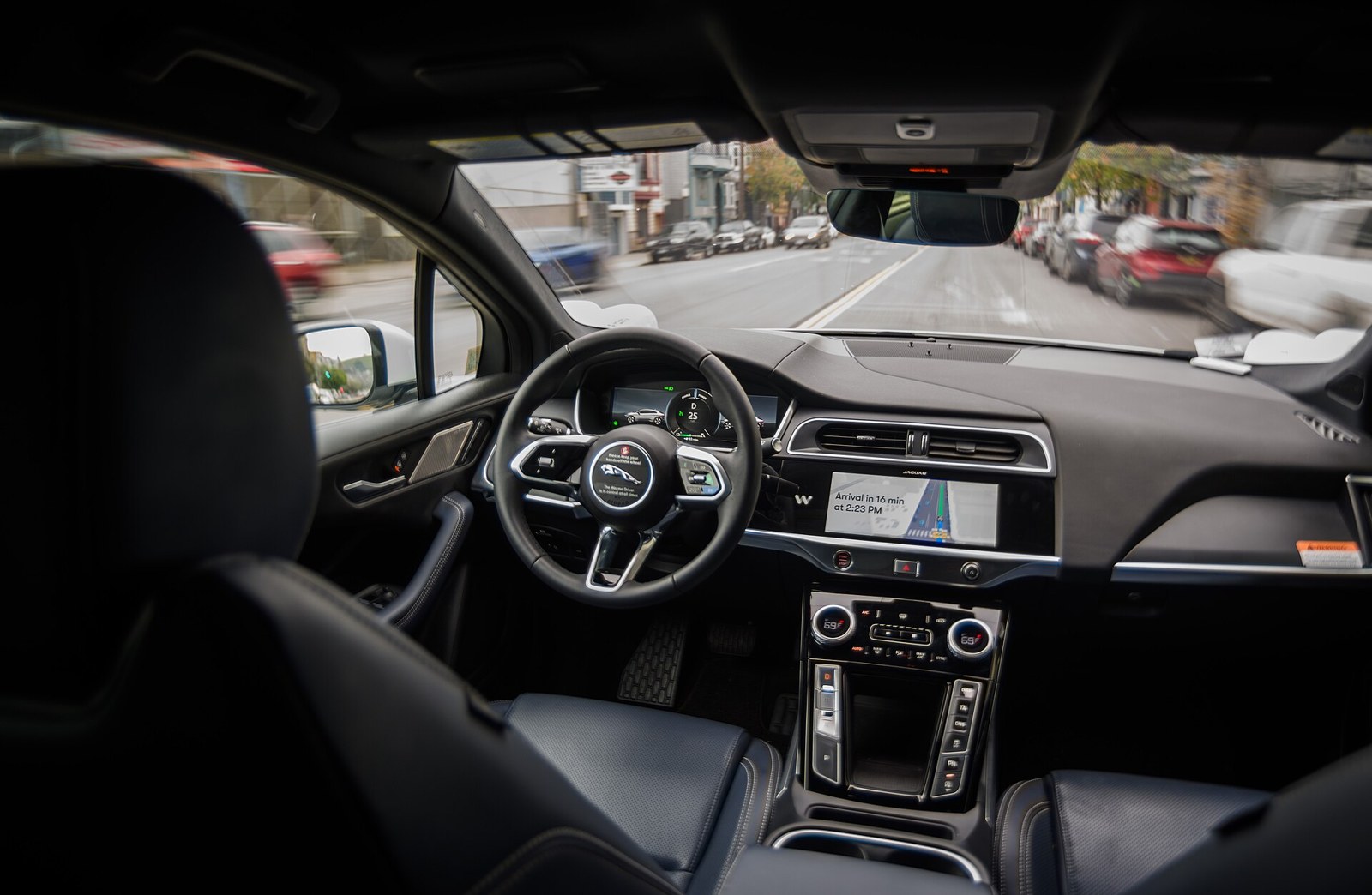 Waymo Heads for Madrid: What Europe's Robotaxi Race Really Tests in 2027 3 - Instant Vista Interior of a Waymo Jaguar I-PACE driving through San Francisco with nobody in the driver's seat